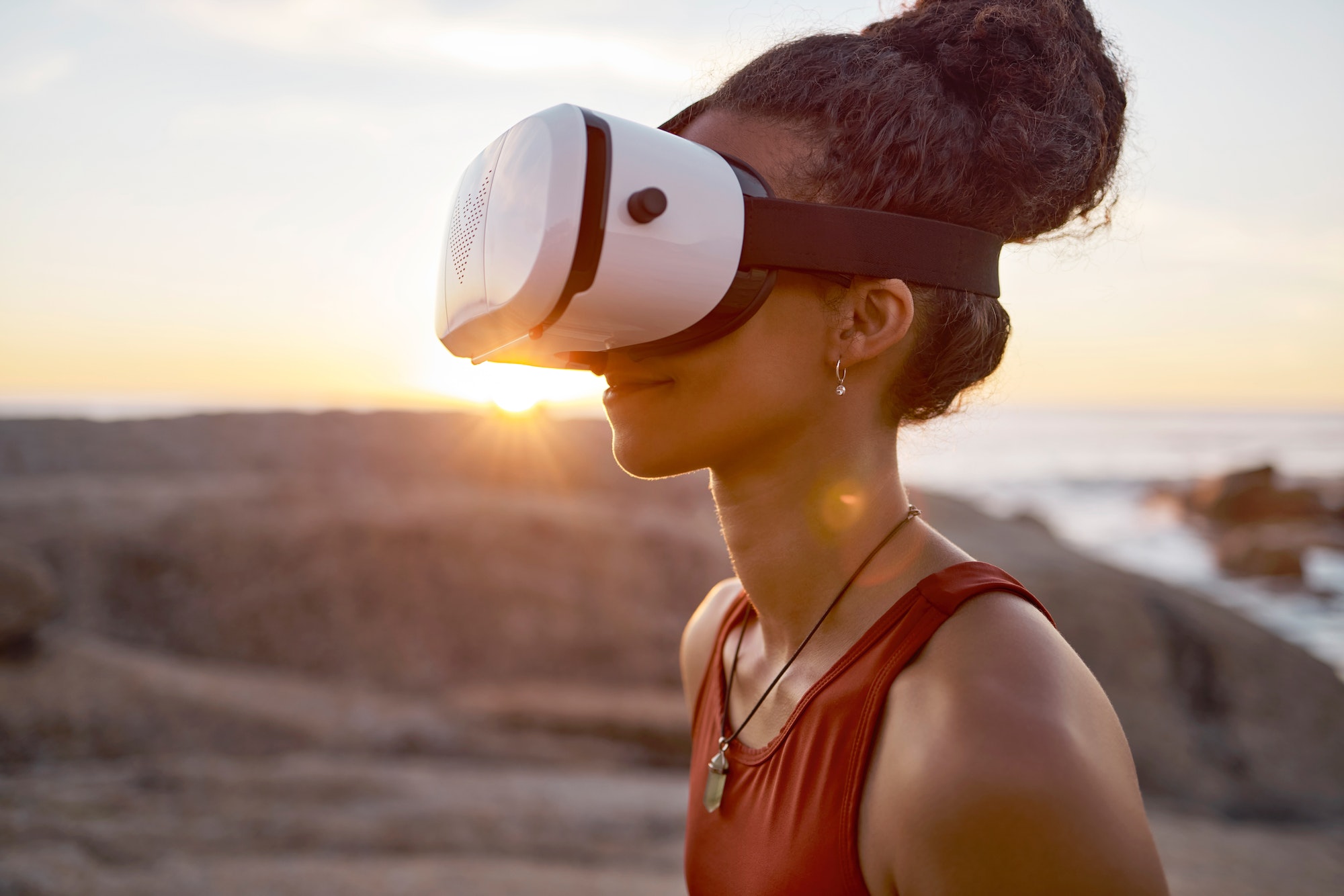 Woman, virtual reality glasses and metaverse while outdoor in nature with ai technology for video g